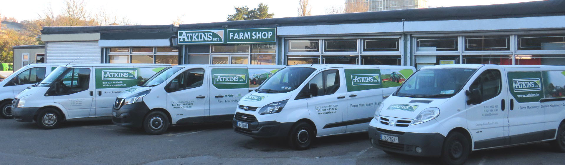 Atkins Vans lined up in front of Atkins Farm Shop on Carrighroane Road